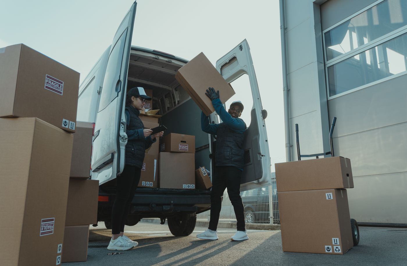 Parcels being loaded into a delivery vehicle